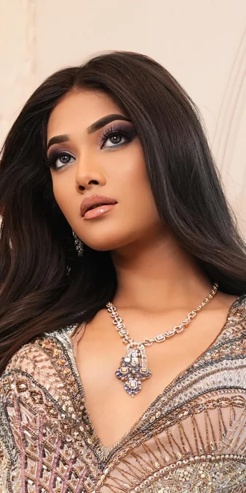 Sherly Jewels model wearing a diamond and emerald necklace
